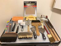 Overview of all painting and drywall tools on tabletop