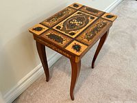 Top and legs of Italian marquetry table showing inlaid design