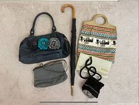 All six accessories laid out on carpet