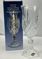 Lamp beside original box showing full form and packaging