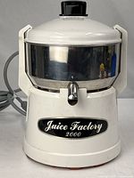 Front view showing branding, spout, overall design