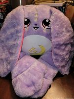 Full view of lavender Moon Pals Opal weighted plush with long ears crossed