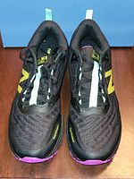 Top view of both shoes showing uppers, laces, and size labeling