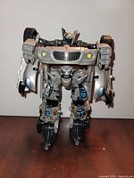 Robot mode front view showing overall condition and missing accessories