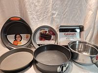 All bakeware and mixing bowls arranged facing forward with labels visible