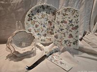 All six matching Japanese floral porcelain pieces displayed: cake plate, cheese board, cake server, cheese cutter, dip bowl and under-dish.