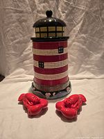 Ceramic lighthouse cookie jar with lobster shakers