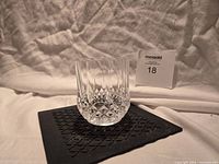 Full view of one Longchamp crystal rocks glass