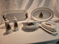 All Pfaltzgraff Christmas Heritage pieces grouped: oval platter, bread tray, salt & pepper shakers, gravy boat with saucer, covered butter dish