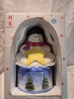 Front view of boxed 10" Merry Brite ceramic snowman cookie jar