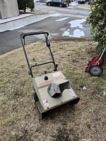 Front angled view of Craftsman snowthrower showing chute and body