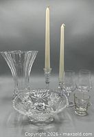 Group shot showing all seven clear glass items