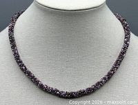 Full view of necklace displayed on form