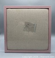 Front view of sealed bulletin board showing fabric surface and frame