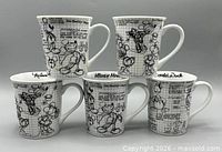 Front and side views of all five Sketch Book mugs