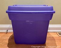 Front view of purple Rubbermaid storage bin with lid attached