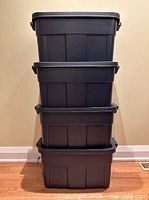 Four stacked indigo bins showing exterior condition