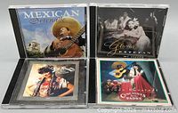 Front view showing all four CD cases and cover art