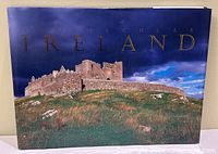 Front cover of Spectacular Ireland book with Rock of Cashel image