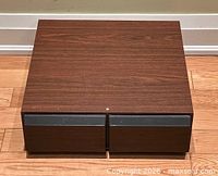 Closed faux woodgrain VCR tape storage box front view