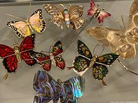 Group shot showing all eight butterfly jewellery pieces