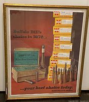 Front view of framed Winchester advertisement print