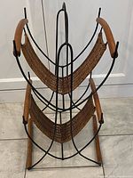 Front view showing two-tier magazine rack structure