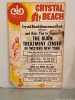 Front of 1976 Crystal Beach Amusement Park poster showing graphics, text and damage
