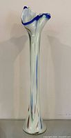 Full view of tall art glass vase