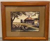Front view of framed print showing artwork, mat, and wood frame