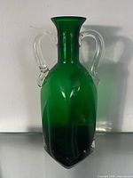 front view showing green body and clear handles