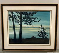 Front view of framed oil painting depicting lake and trees