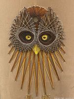 Close view of owl face string pattern