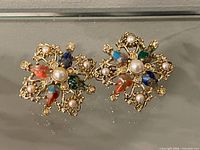 Front view showing design, stones and pearls