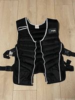 Full view of weighted vest laid flat