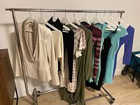 Full clothing rack showing all nine garments