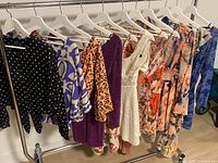 Full view of all dresses on rack