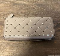 Front view of studded wallet exterior