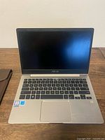 Laptop open showing screen, keyboard and overall design