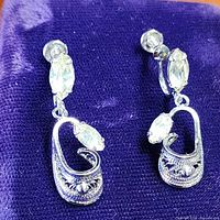 Front view of both earrings showing overall design