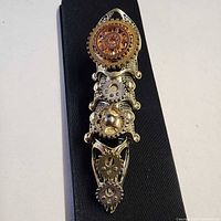 Top view showing full length articulated ring with gears