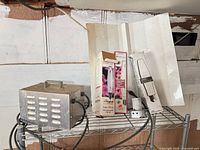 Overall view: ballast, reflector, two bulb boxes, junction box on wire shelf