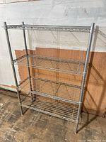 Full view of four-shelf metal wire rack