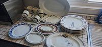 assorted dinnerware on counter showing all pieces