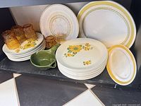 entire lot of plates, tumblers and dish