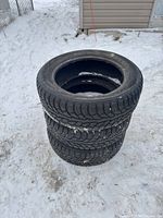 Stack of three Hankook winter tires