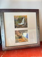 Full view of wooden frame with two matted prints