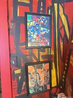 Front view showing both framed artworks on wall
