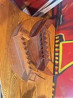 Both wooden crescent moon staircase shelves front view