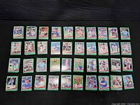 All cards laid flat showing fronts, arranged in six rows